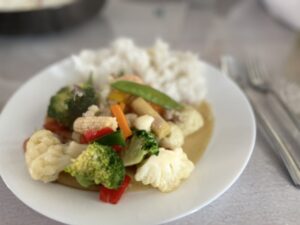 Chop suey on white plate with Rice