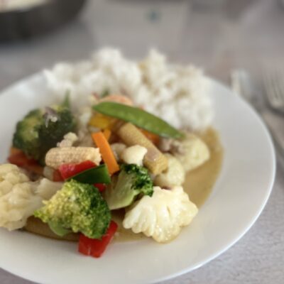 Chop suey on white plate with Rice