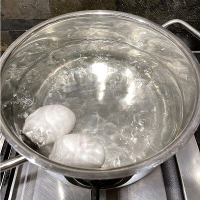 Boil two eggs for garnishing Palabok