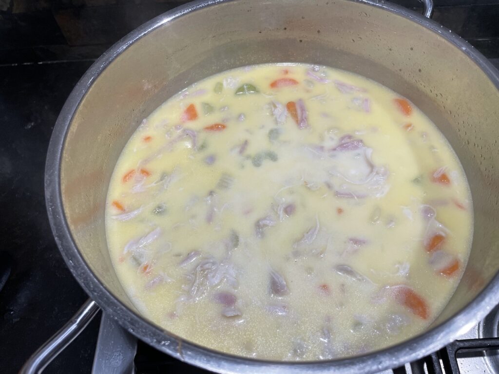 Chicken Macaroni Soup in big pan with all ingredients Except Cabage