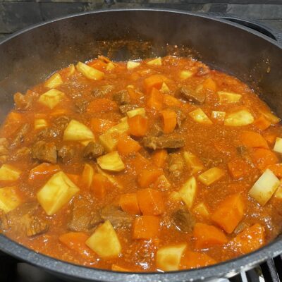 Add-potatoes-and-Carrots-to-menudo-recipe-mixture