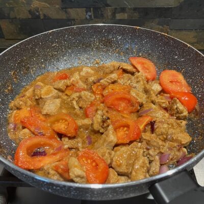 Cook Pakbet mixture until tomatoes are tender