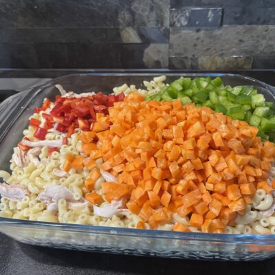 Mixed Macaroni with chicken - on top green bell pepper - Sweet red bell pepper and carrots