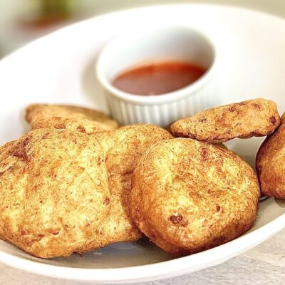 Golden brown and crispy homemade chicken nuggets cooked to perfection.
