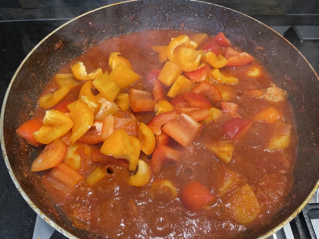 Pork Caldereta - add the sliced bell peppers