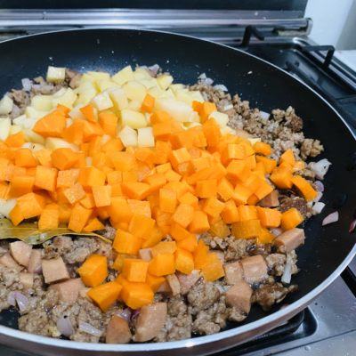 Add Chopped Potatoes and Carrots for Pork Giniling Recipe